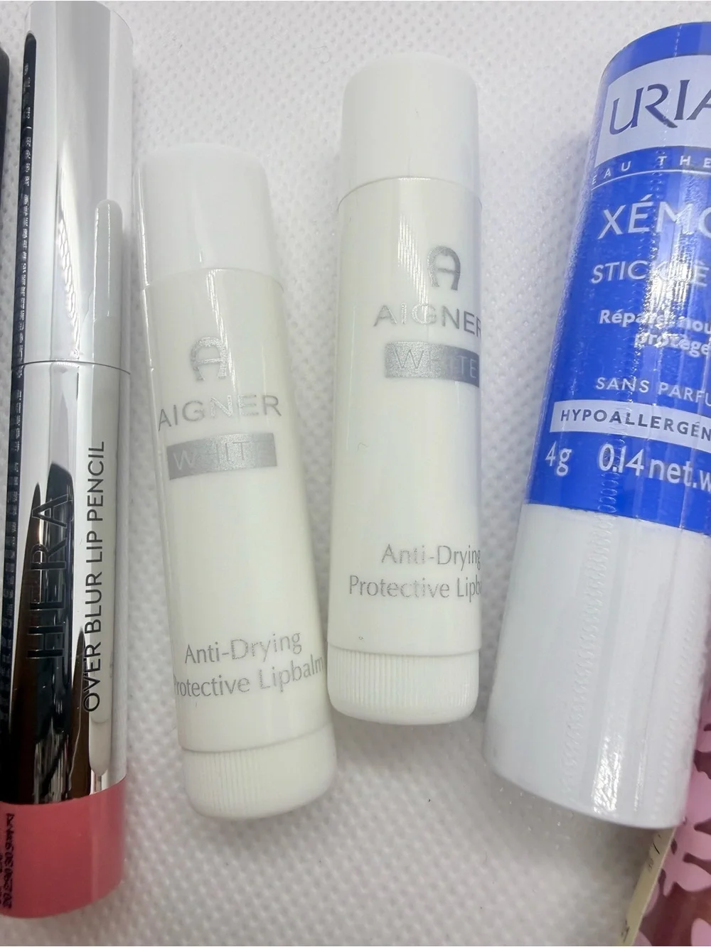 Mixed Lip Product Bundle: Lipstick, Gloss, Balm, Pencil - HERA, Uriage +